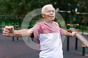 Fitness, sport and healthy lifestyle concept happy senior woman exercising at park