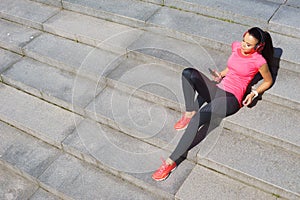 Fitness, sport, urban jogging and healthy lifestyle concept. Young woman training outdoor.