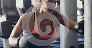 Fitness, sports and boxing with woman in gym for training, workout and mma challenge. Performance, energy and power with