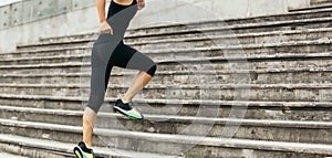 Fitness sporty woman running upstairs