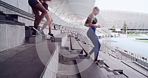 Fitness, stadium stairs and people running for cardio practice, outdoor workout or sports team commitment. Arena