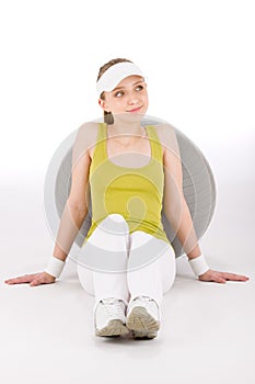 Fitness teenager woman in sportive outfit