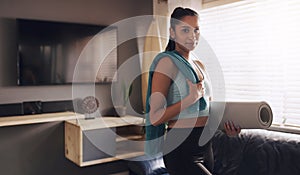 Fitness, towel and portrait of woman with mat for cardio exercise, training or workout at home. Female person, health