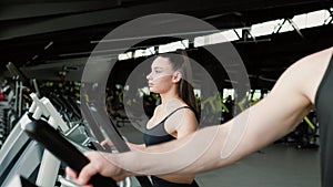 Fitness Trainer Guiding a Dynamic Workout Session at the Gym