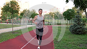 fitness trainer training anaerobic load in the park, healthy lifestyle