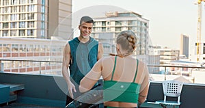 Fitness, training and high five for success of boxing woman athlete on city rooftop with kick pad. Achievement, winner
