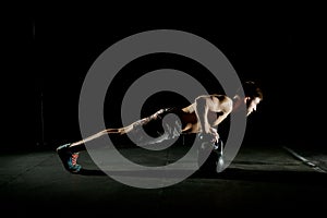 Fitness training. Man doing push ups exercise.