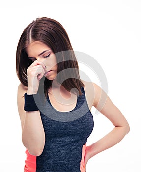 Fitness woman covering her nose with hand