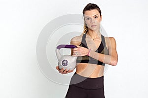 Fitness woman do kettlebell swing. Crossfit training.  on white background. - Image