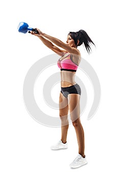 Fitness woman do kettlebell swing and kettlebell