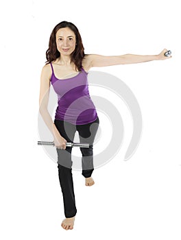 Fitness woman doing arm raising with weights