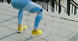 Fitness Woman doing Squats Exercise for Glute with Resistance Band. Athletic