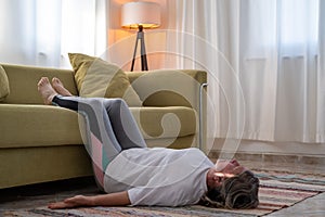 Fitness woman doing stretch exercise stretching her body.