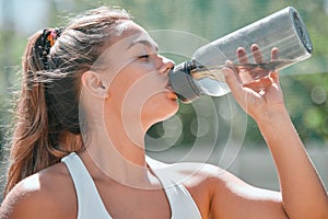 Fitness, woman and drinking water bottle after training workout, exercise and outdoor cardio running in Australia