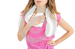 Fitness woman drying her sweat after sports