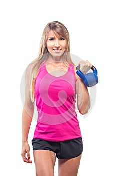 Fitness woman exercising crossfit holding kettlebell strength tr