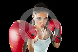 Fitness woman with girl red boxing gloves posing in defiant and competitive fight attitude