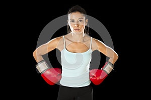 Fitness woman with girl red boxing gloves posing in defiant and competitive fight attitude