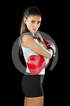 Fitness woman with girl red boxing gloves posing in defiant and competitive fight attitude