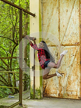 Fitness woman hanging exercise