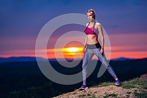 Fitness Woman on Hills at Sunset