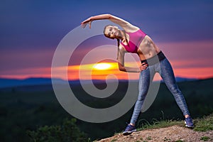 Fitness Woman on Hills at Sunset