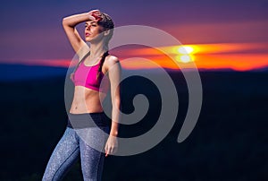 Fitness Woman on Hills at Sunset