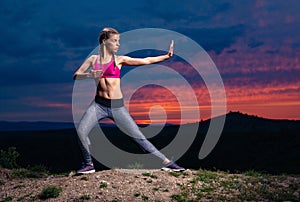 Fitness Woman on Hills at Sunset