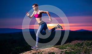 Fitness Woman on Hills at Sunset