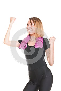 Fitness woman jumping excited isolated female smiling showing mu