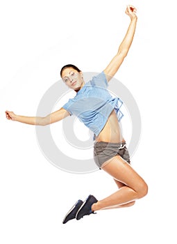 Fitness woman jumping of joy.