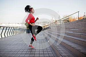 Fitness woman jumping outdoor