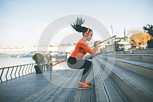 Fitness woman jumping outdoor