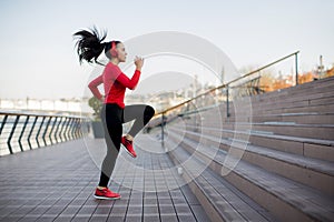 Fitness woman jumping outdoor