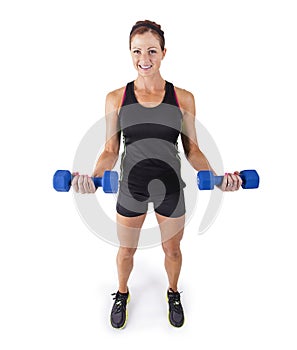 Fitness woman lifting free weights on a white background