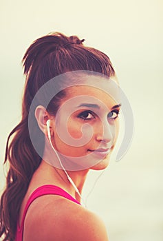 Fitness Woman Listening to Music