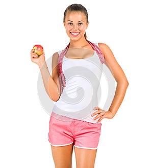 Fitness woman with a measuring tape