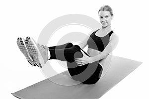 Fitness woman portrait isolated on white background.