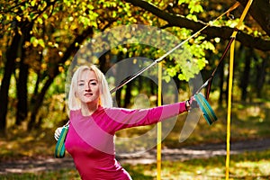Fitness woman Resistance training in park