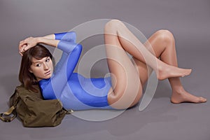 Fitness woman resting on the ground