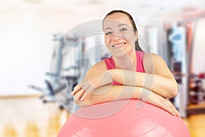 Smiling woman at the pilates class photo