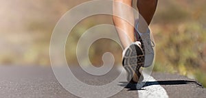 Fitness woman runner athlete running at road