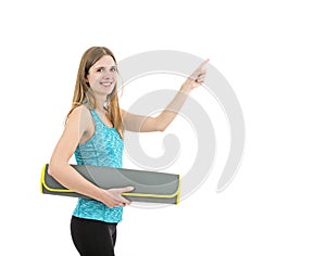 Fitness woman showing copy space