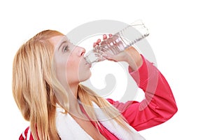 Fitness woman sport girl with towel drinking water