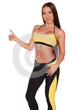 Fitness woman standing against isolated white background