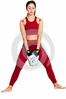 Fitness woman workout with kettlebell. Photo of  woman isolated on white background. Strength  - Image