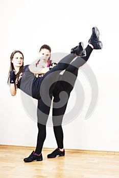 Fitness women doing kick boxing