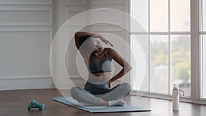 Fitness Workout. Black Sporty Woman Stretching Neck Muscles While Training At Home