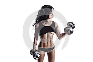 Fitness young woman in sport wear with perfect fitness body training with dumbbells