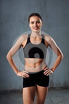 Fitnesswoman posing in sportswear.